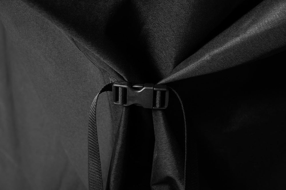 Close-up of secure side buckle on Blackstone 36-inch grill cover ensuring a snug fit and wind-resistant outdoor security