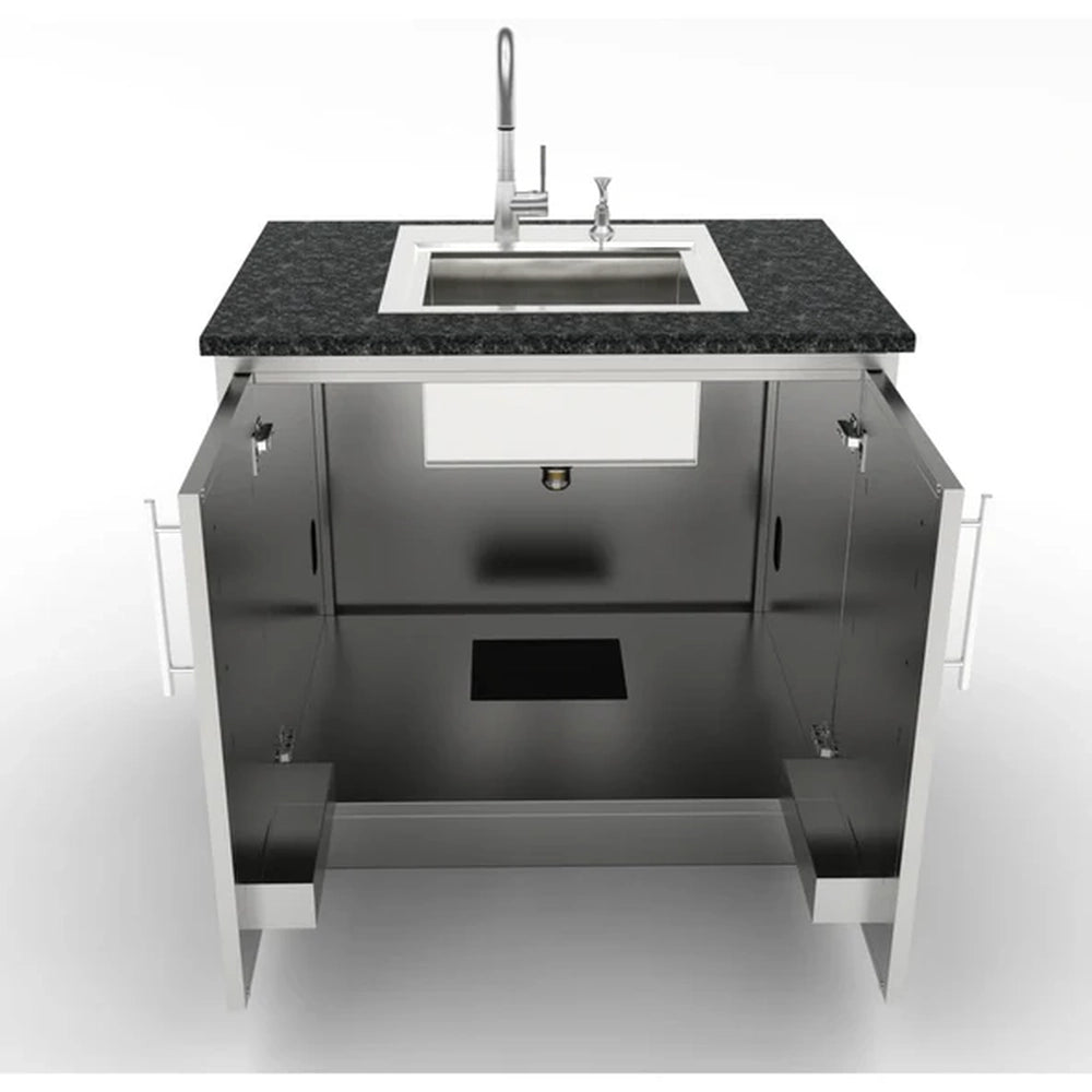 Internal view of the Sunstone 36-inch base cabinet configured as a sink base with countertop, faucet, and plumbing access cutouts for outdoor kitchens.