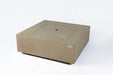 Elementi Plus Uluru fire table used as a patio coffee table with burner lid.