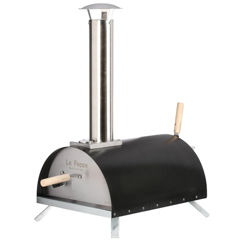 Close-up of a pizza baking inside the WPPO Le Peppe wood-fired oven next to hot coals and a fire guard.