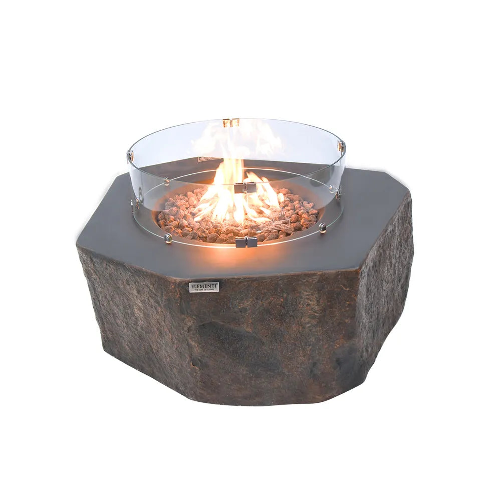 Natural stone-look fire table equipped with a circular tempered glass wind guard.