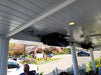SunStar SGL0 heaters used for high-bay industrial heating in an open-air patio.