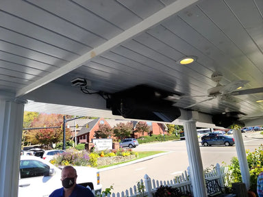 SunStar SGL0 heaters used for high-bay industrial heating in an open-air patio.