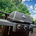 Broil King Crown 310 Shadow gas grill in black on patio