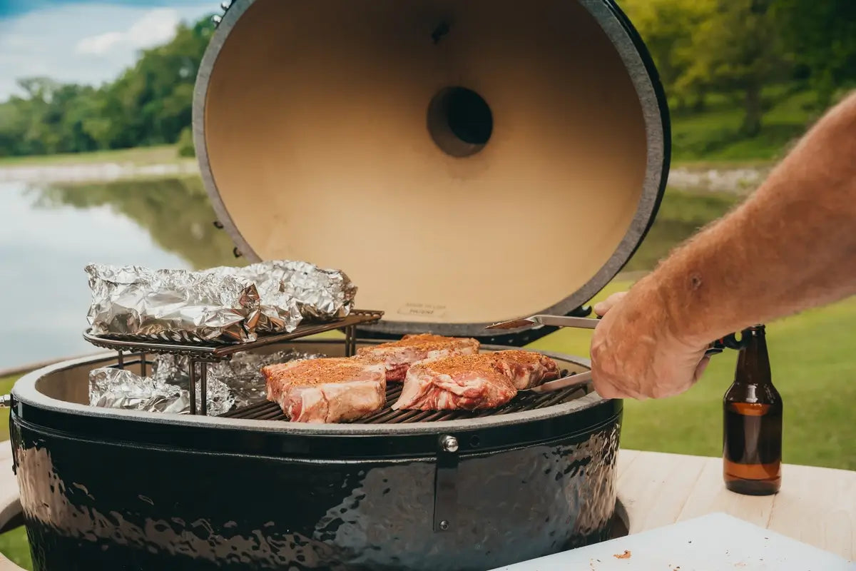 Primo PGCXLH Oval XL 400 Ceramic Kamado Grill With Stainless Steel Grates Lifestyle