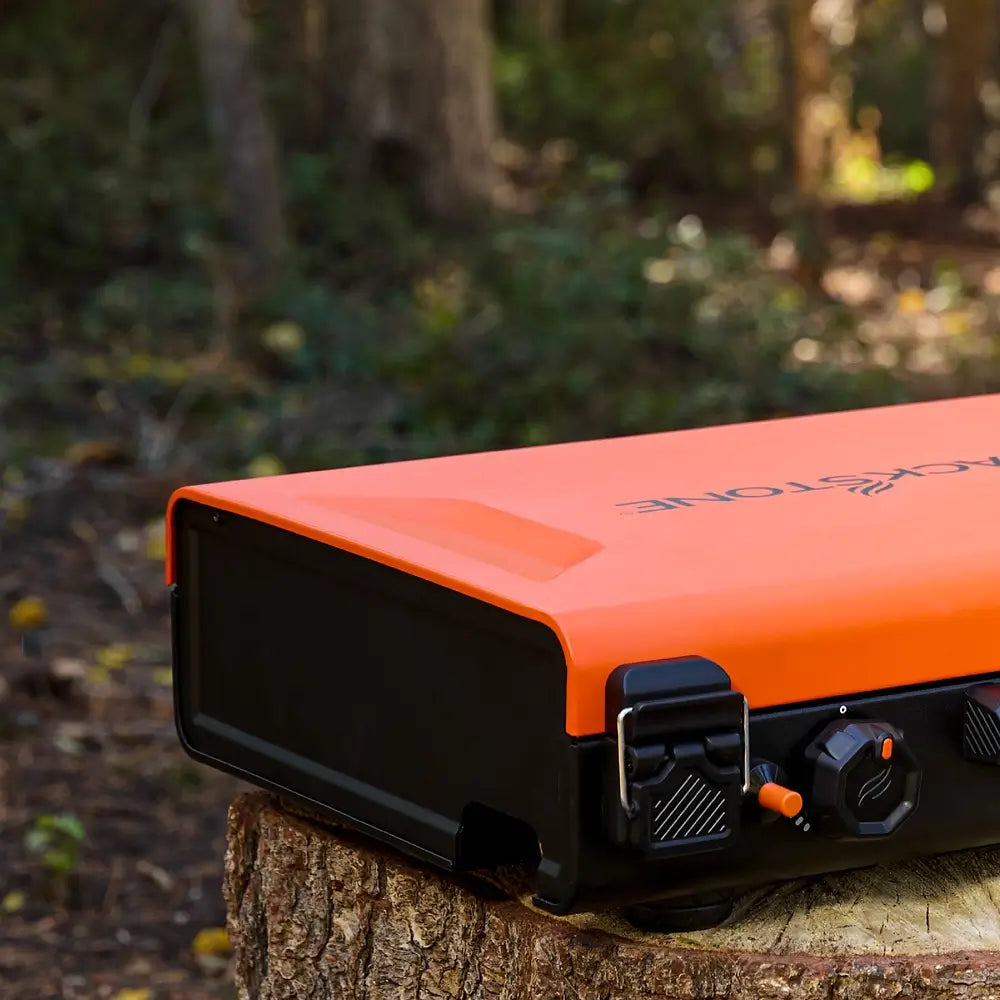 Compact and closed Blackstone 20"x14" griddle with latching hood, highlighting its slim and portable design for outdoor adventures.