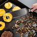 Blackstone Spatula Flipping Pineapple Rings on Hot Flat Top Grill – Commercial-Grade Griddle Tools for Outdoor Cooking