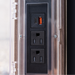 Close-up of Blackstone Pavilion built-in power strip with AC outlets and USB ports for griddle accessories