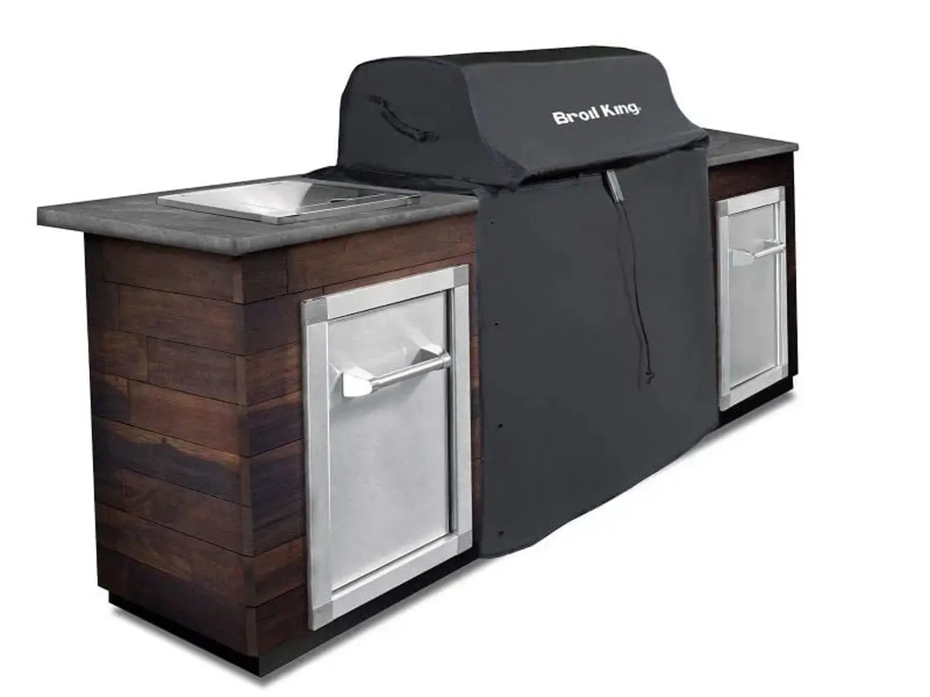 Broil King 68590 grill cover for 600 Series protecting a built-in grill in a wood-style outdoor kitchen island.