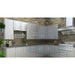 A professional outdoor kitchen setup featuring Sunstone stainless steel cabinetry, including the 18-inch full-height wall cabinet integrated into a stone wall design.
