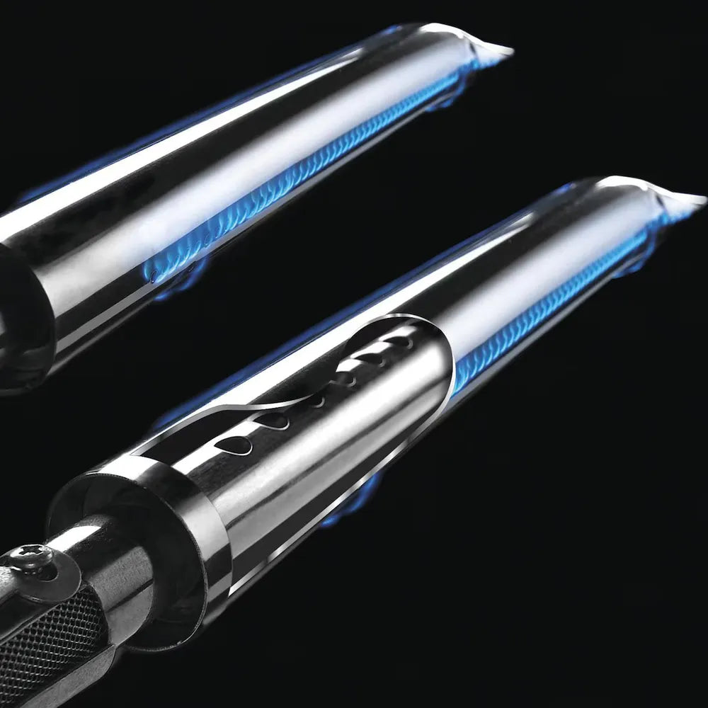 Broil King Regal S420 Dual-Tube burners with blue flame, close-up