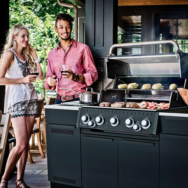 Broil King Baron 590i Grill Center with side burner in outdoor kitchen