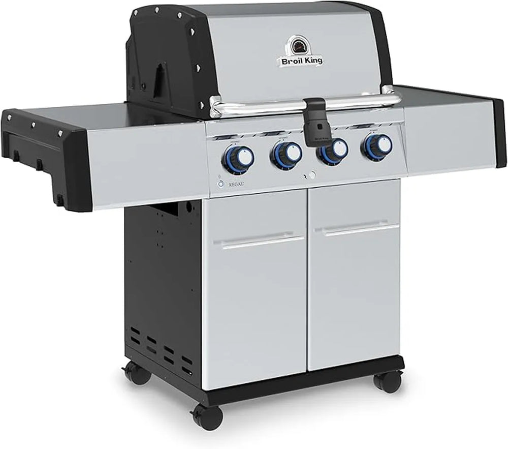 Broil King Regal S 420 Pro stainless gas grill, angled left-front product view with side shelves and locking caster wheels