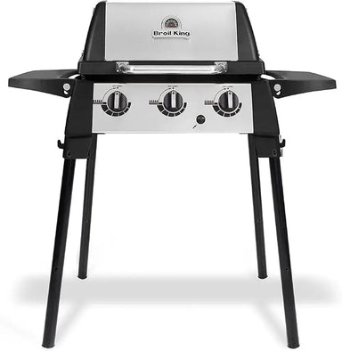 Broil King Porta-Chef 320 portable gas grill on foldable black stand with stainless steel lid, three burner control knobs, and dual side shelves, shown front-facing on a light gray background.