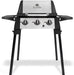 Broil King Porta-Chef 320 portable gas grill on foldable black stand with stainless steel lid, three burner control knobs, and dual side shelves, shown front-facing on a light gray background.