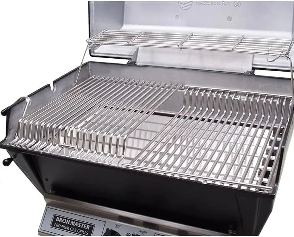 Stainless steel cooking grates and warming rack in the Broilmaster 25 inch built-in gas grill interior