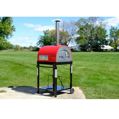 WPPO Traditional 25 dual fuel pizza oven with red dome, chimney, black cart, wheels, and outdoor lawn setting.