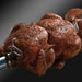 Broil King Imperial S 470 rotisserie chicken on spit rod