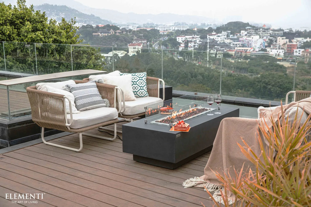 Elementi Granville OFG121DG Fire Table - 60" Dark Gray featuring a clear tempered glass wind guard.