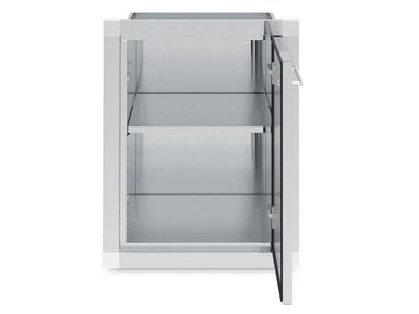 Interior view of the Broil King 800110 outdoor cabinet showing a spacious storage compartment with an adjustable stainless steel shelf and right-swing door.