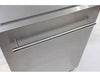 Top-down view of the durable stainless steel exterior and sleek towel-bar handle of the Broil King 24-inch outdoor fridge.