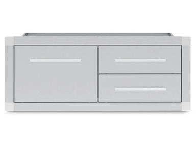 Front view of the Broil King 800910 Premium Stainless Steel Triple Drawer Storage Assembly for outdoor kitchens, featuring a sleek weather-resistant design and three horizontal handles.