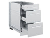 A three-quarter view of the Broil King 802500 stainless steel 3-drawer cabinet storage base with all three drawers fully extended, showcasing the internal storage capacity and drawer glides.