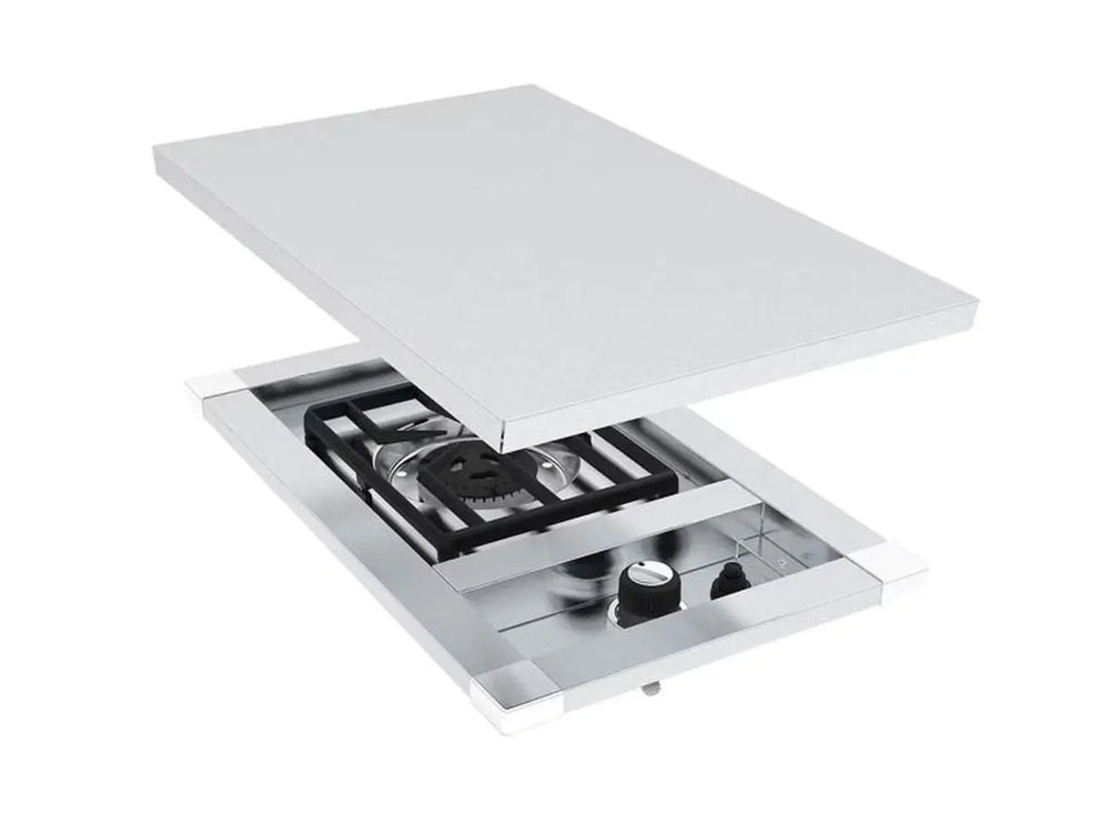 Angled view of the Broil King Imperial S100 gas side burner with the stainless steel lid being removed.