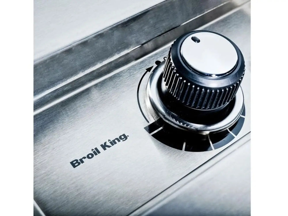 Close-up of the Broil King Imperial S100 control knob and etched logo on the premium stainless steel bezel.