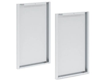 An angled perspective view of two silver Broil King 803060 Corner Cabinet Rear Panel Finishes, showing the depth of the frame and the metal's texture, against a white background.