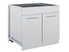 Broil King 804200 stainless steel 2-door outdoor kitchen cabinet storage base, closed front angle view showing sleek door handles and modular side panels.
