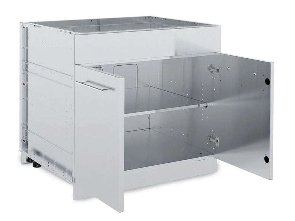 Interior view of Broil King 804200 2-door storage cabinet with doors open, showcasing the stainless steel adjustable shelf and spacious storage compartment.