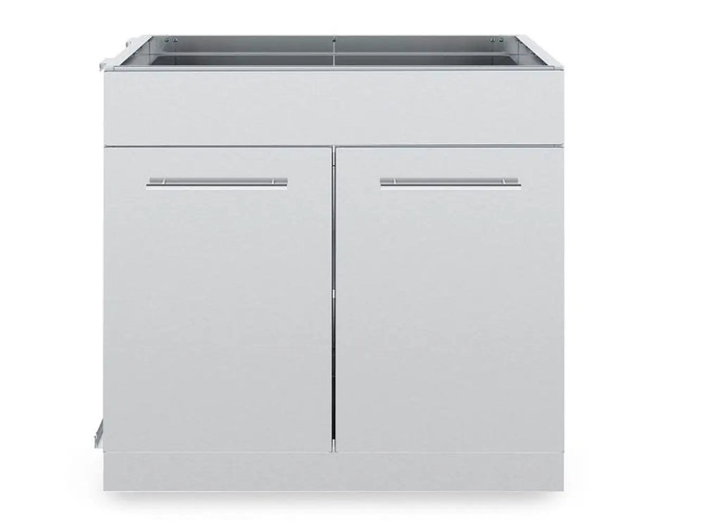 Front profile of Broil King 804200 outdoor kitchen storage base featuring symmetrical double doors and heavy-duty stainless steel construction.