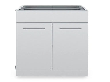 Front profile of Broil King 804200 outdoor kitchen storage base featuring symmetrical double doors and heavy-duty stainless steel construction.