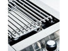 Close-up of the ceramic infrared burner element and professional-grade cooking grate on the Broil King Imperial S100.