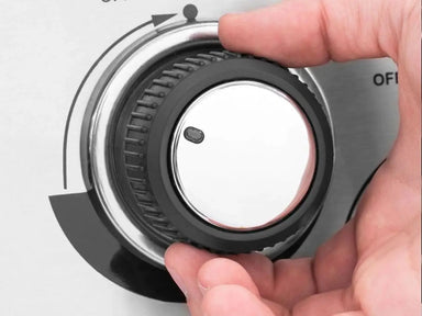 Close-up of the premium LED-lit control knob on a Broil King Imperial S 590iE gas grill for precise temperature management.