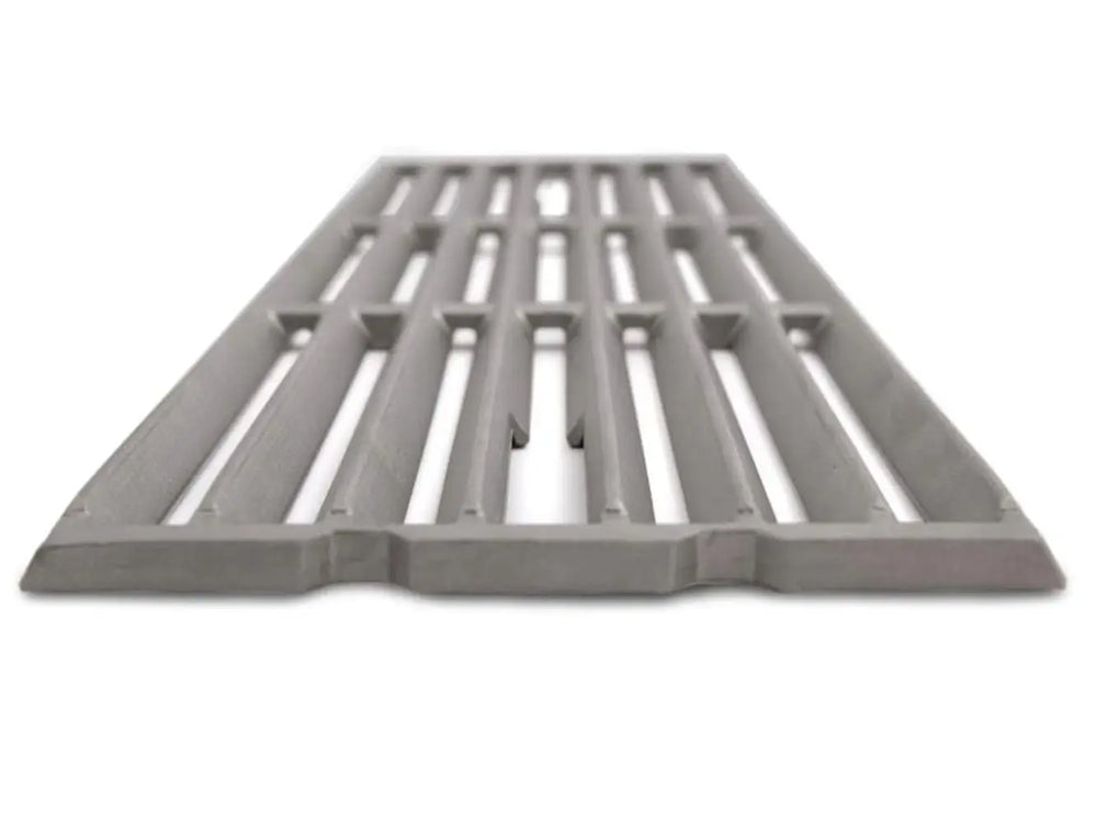 Close-up low-angle view of heavy-duty professional-grade cast stainless steel cooking grates for a Broil King Imperial grill.