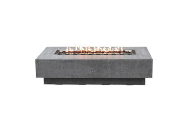 Lit Elementi Hampton OFG139LG Fire Table 56" in light gray GFRC with linear flames and lava rocks.