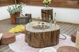 Elementi Manchester OFG145RW 42" Fire Table burner pan filled with lava rocks and a rustic wood-style rim.