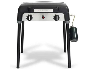 Broil King Porta-Chef Stove 200 portable propane stove on four detachable legs with two burner control knobs, center ignition button, and attached green propane canister on a light gray background.