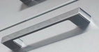Sunstone P-BHandle signature series beveled handle, brushed stainless rectangular bar pull with 6-1/4 inch center-to-center spacing, close-up on panel background.