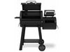 Front view of the Broil King Regal Charcoal Offset 400 smoker grill with both lids open to show the main chamber and side firebox interiors.