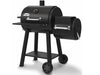 Angled product view of the Broil King Regal Charcoal Offset 400 smoker grill featuring a front shelf, chimney, and wheeled black steel cart.
