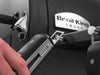 Built-in bottle opener mounted on the side of the Broil King Regal Charcoal Offset 500 smoker grill.
Close-up of a black transport wheel on the Broil King Regal Charcoal Offset 500 smoker grill cart.