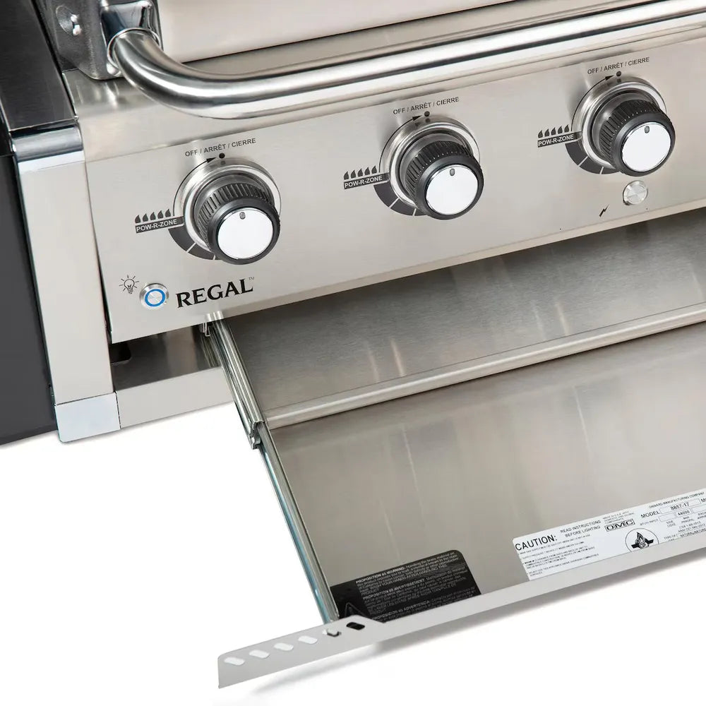 Broil King Regal S520 grill control panel and pull-out grease tray