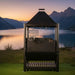 Tagwood BBQ BBQ12SI Santa Maria Gaucho Grill with chimney hood by mountain lake at sunset