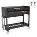 Tagwood BBQ18SI Argentine charcoal grill with lid closed on mobile cart