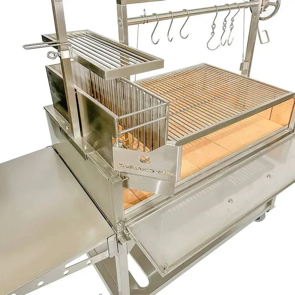 Tagwood BBQ23SS XL Santa Maria grill close-up of side charcoal starter basket and cooking grate