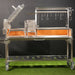 Tagwood BBQ26SS XL Santa Maria grill open firebox view with firebrick interior and adjustable grates
