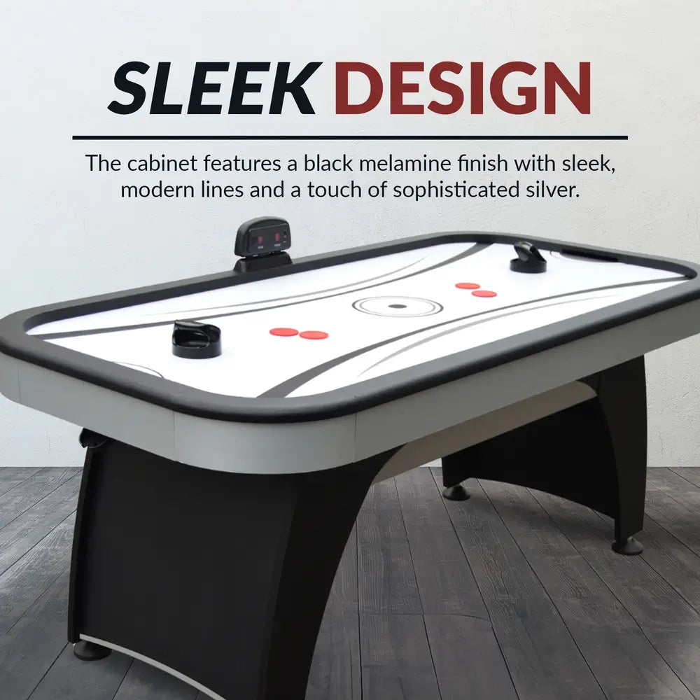 Silverstreak air hockey table with sleek design featuring black melamine cabinet, silver accents, and modern curved base for stylish game room decor.
